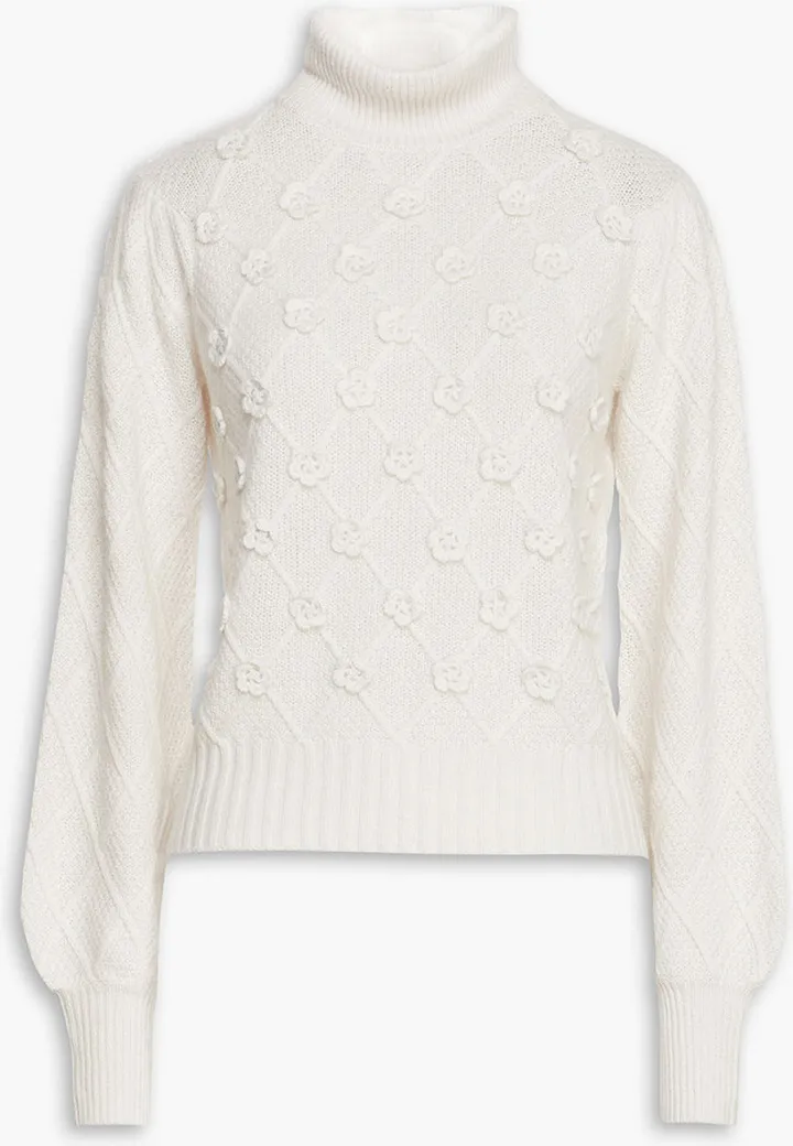 Floral-appliqued crochet-knit turtleneck sweater