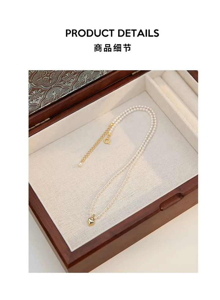 Pearl love heart necklace