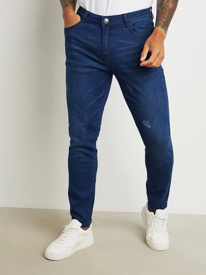 Light Distress Skinny Jeans