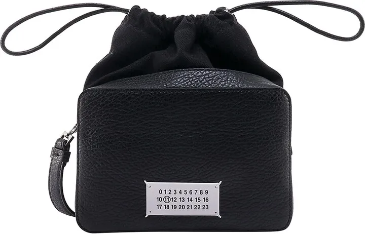 Leather shoulder bag with frontal logo patch