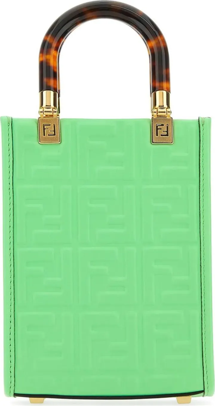 Handbag realized in smooth calf leather characterized by FF motif print in relief on the entire surface.