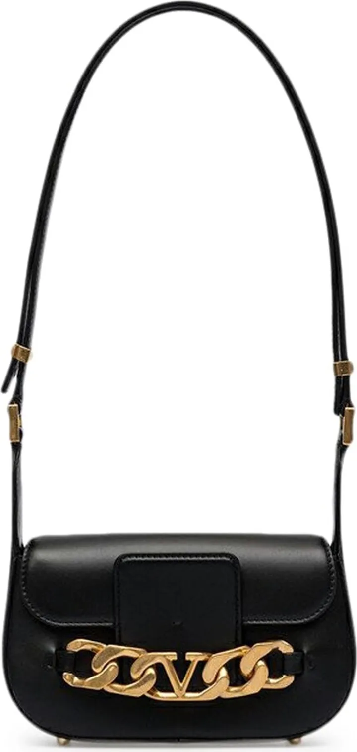Valentino Garavani VLogo Chain small shoulder bag in calfskin. Detailed metal chain from Vlogo Signature element.