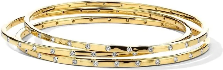 18kt yellow gold Stardust diamond bangle set