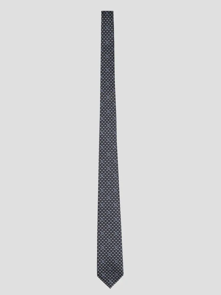 Gucci silk tie with Round Interlocking G and geometric print.