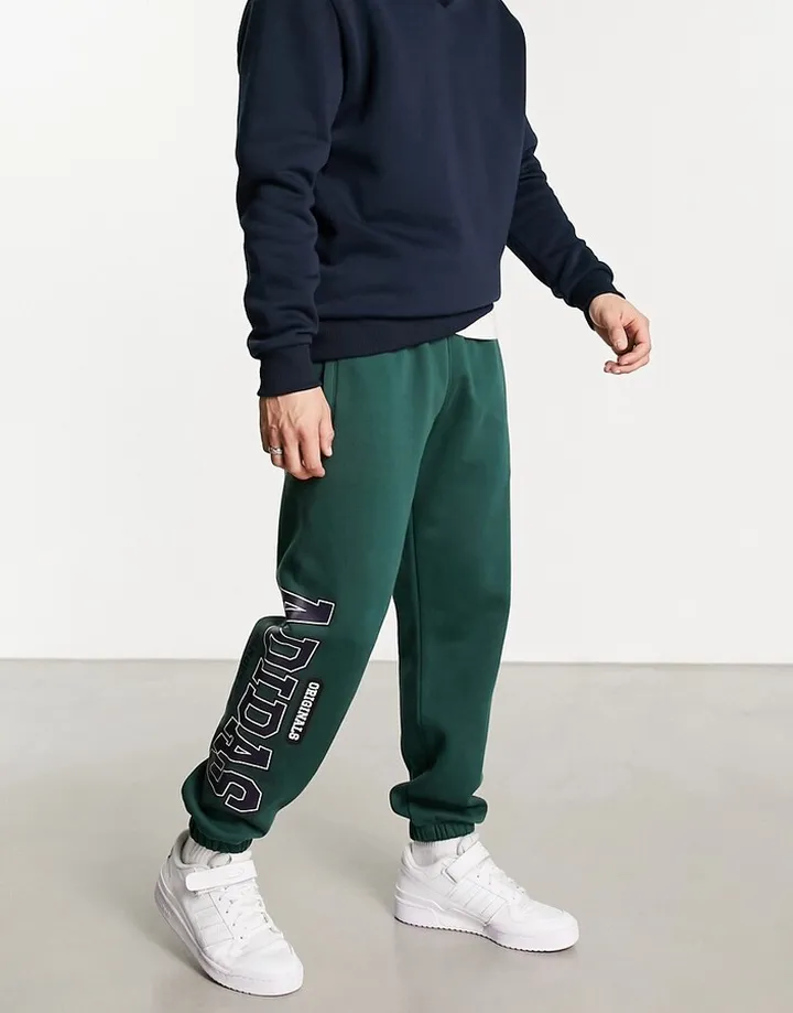 adidas Originals Preppy Varsity large logo oversized sweatpants in dark green