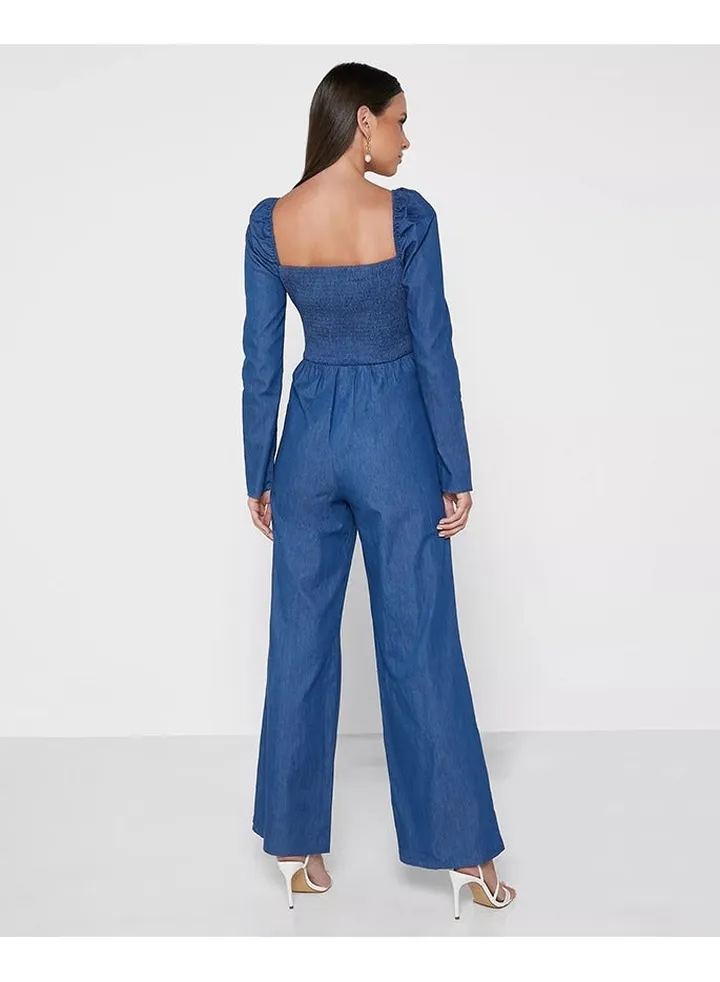 Little Mistress Denim Flared Leg Jumpsuit With Tie Detail