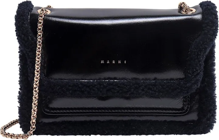 Leather shoulder bag with wool profiles