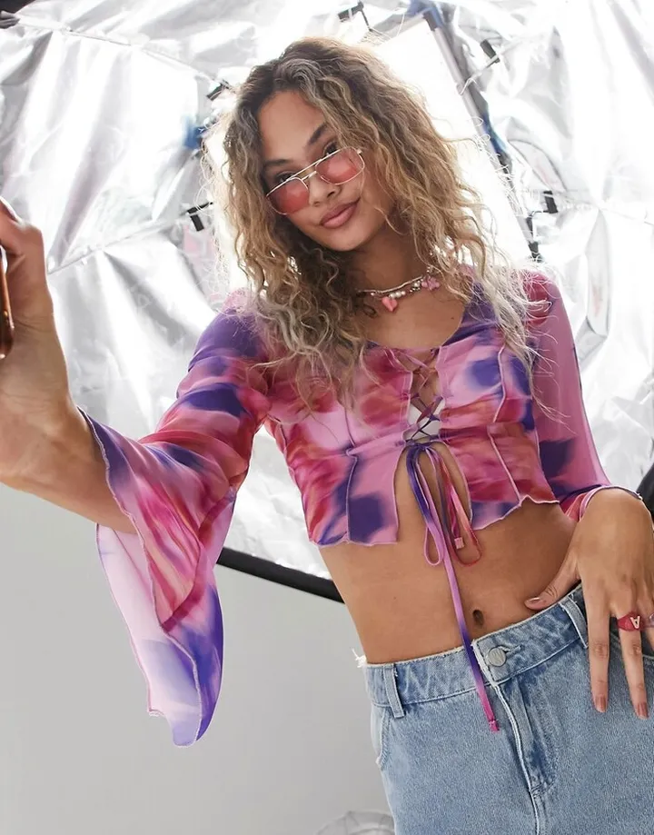 ASOS DESIGN top with lace-up detail & contrast piping in bright pink & purple floral
