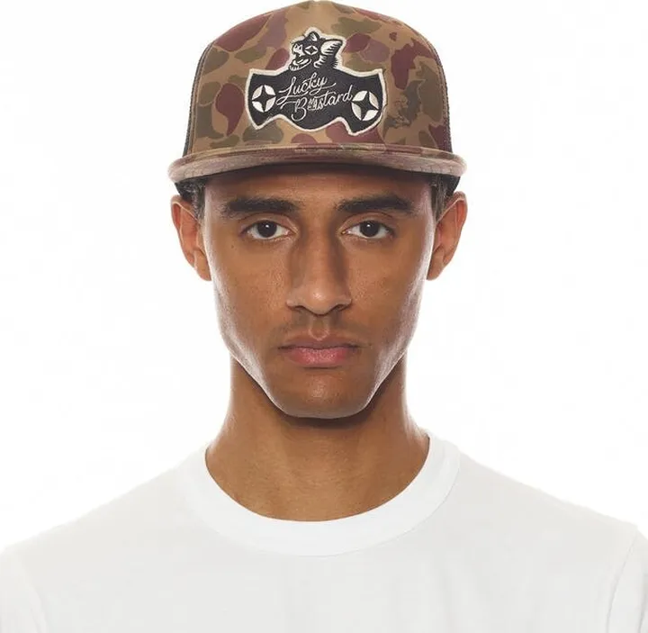Cult of Individuality Lucky Bastard Mesh Back Trucker Curved Visor Hat - Brown