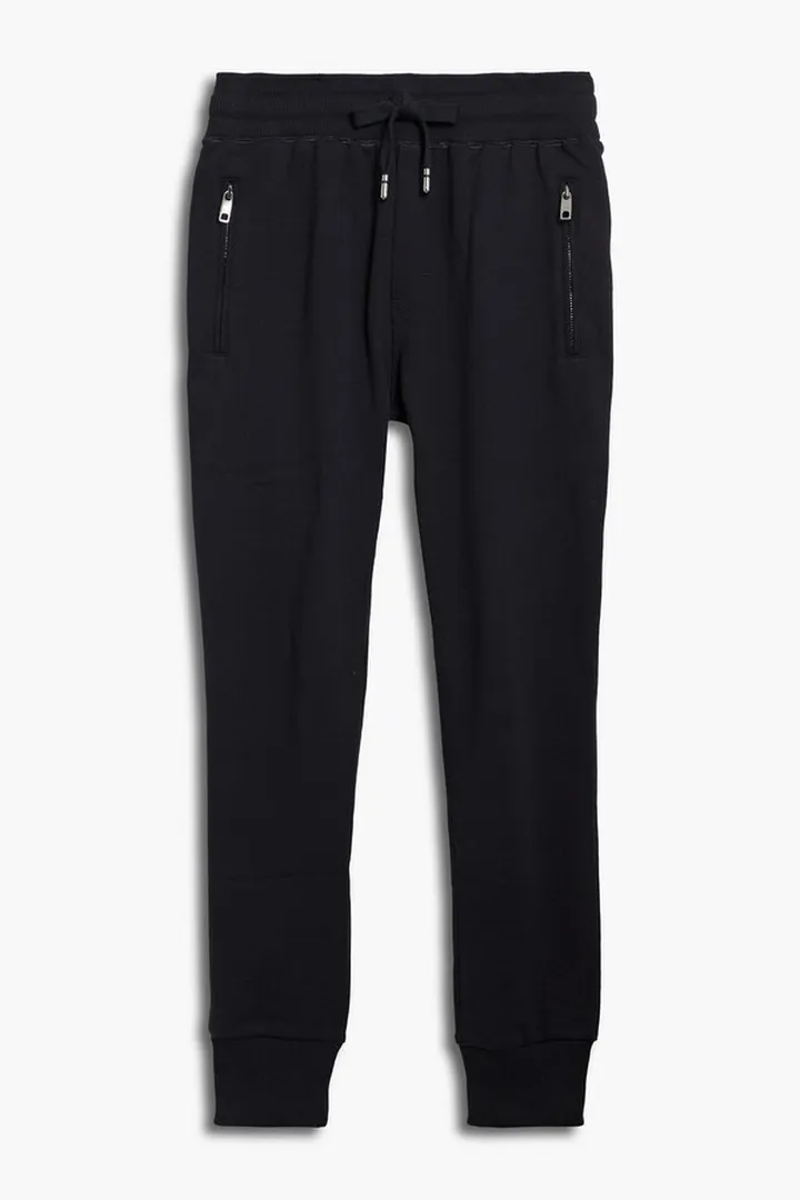 Tapered logo-appliquéd cotton-blend twill pants