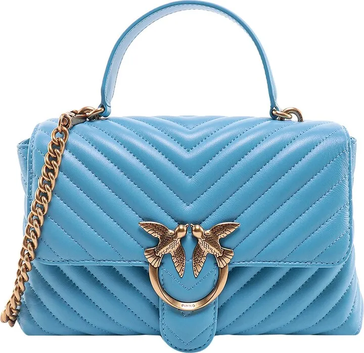 Matelassé leather handbag with Love Birds buckle