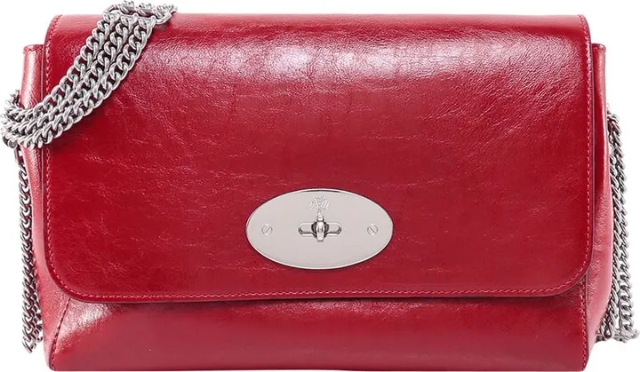 Leather shoulder bag with engraved logo