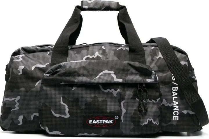 X Undercover Camouflage Print Holdall Bag