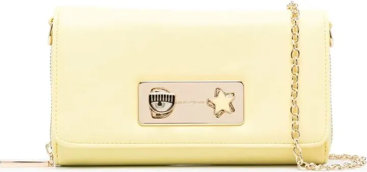 Pocket With Shoulder Band And Rotatable Logo As Opening