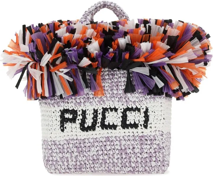 Handbag realized in raffia with peculiar insert at the top characterized by embroidered logo at the front.