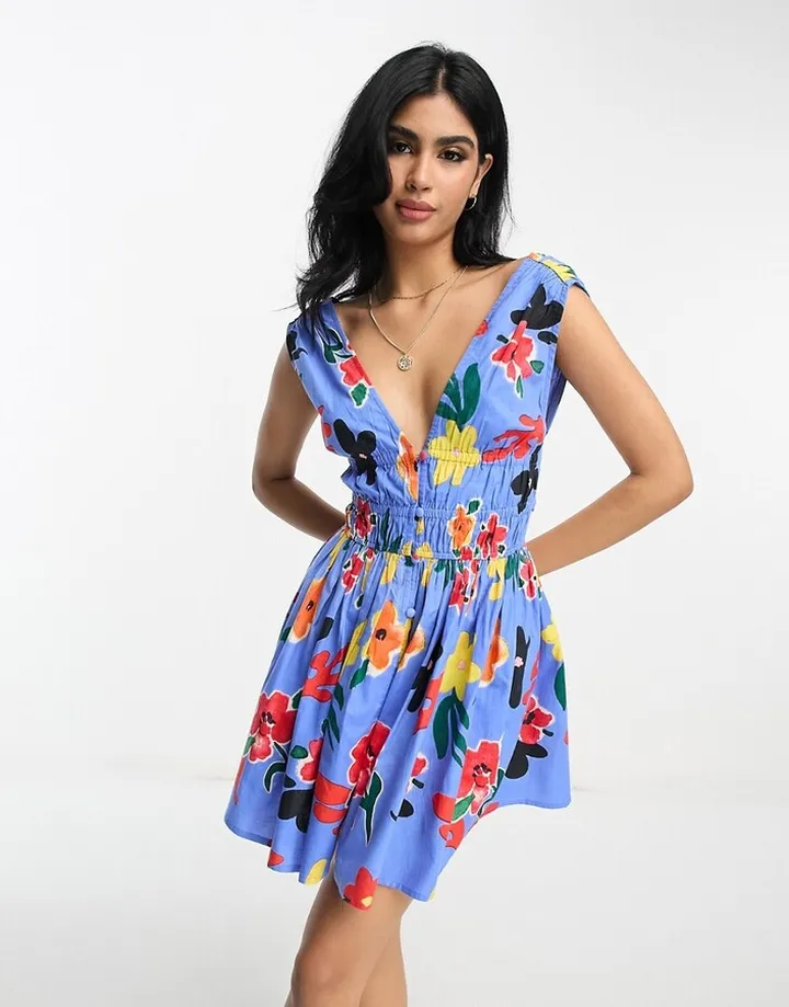 ASOS DESIGN cotton plunge button through mini sundress with elastic channel detail in bright blue floral