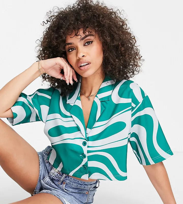 Fila swirl print cropped shirt in blue