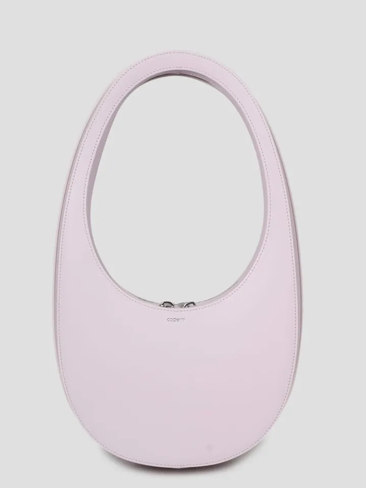 Coperni leather mini oval-shaped bag.
