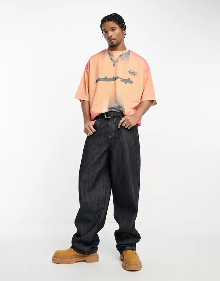 ASOS DESIGN oversized t-shirt in orange retro sports print