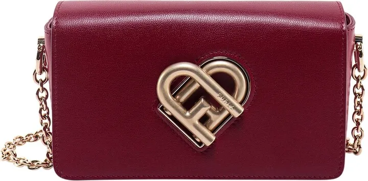 Leather shoulder bag with iconic frontal Arch
