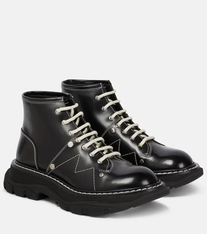 Tread patent leather ankle boots