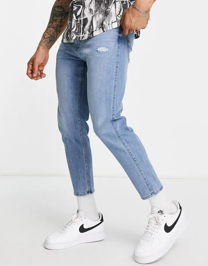 Hollister tapered crop fit knee distressed jeans in mid wash