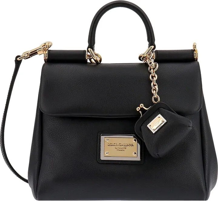 Leather bag with logoed metal plate