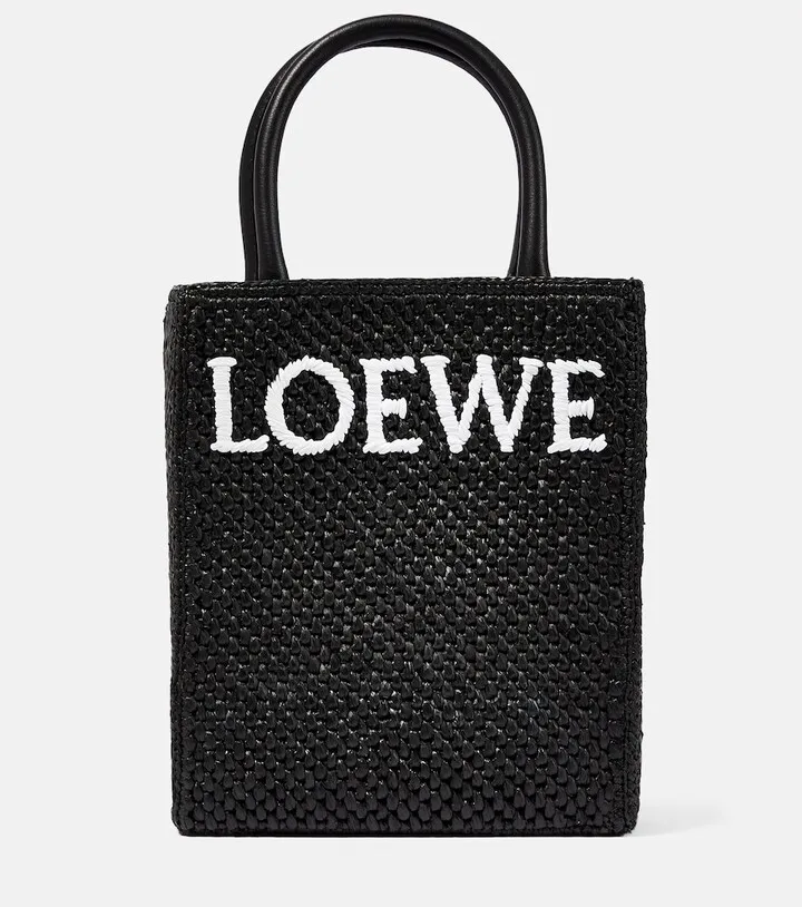 Leather-trimmed raffia tote bag