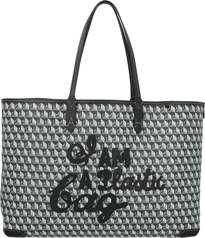 Anya Hindmarch 'I Am A Plastic Bag' shopping bag in canvas made from recycled plastic and embellished with all over prints and leather details.