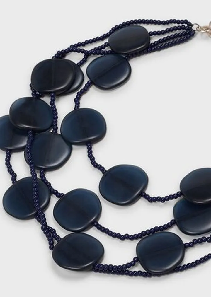 Multistrand necklace with plexiglass micro spheres and stones