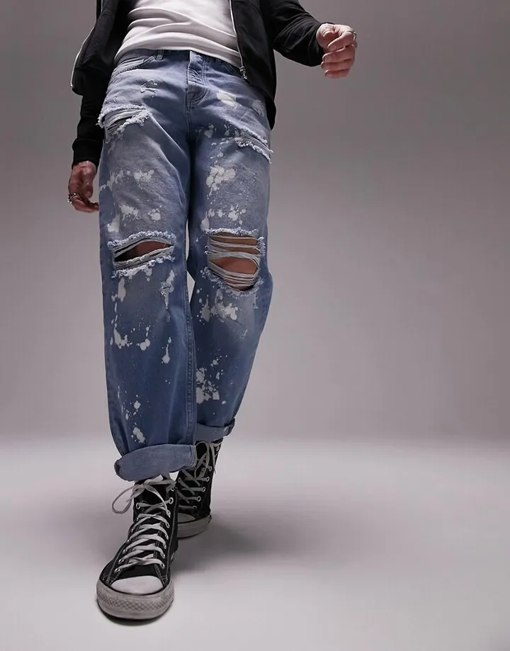 Topman rip and bleach relaxed jeans in mid wash