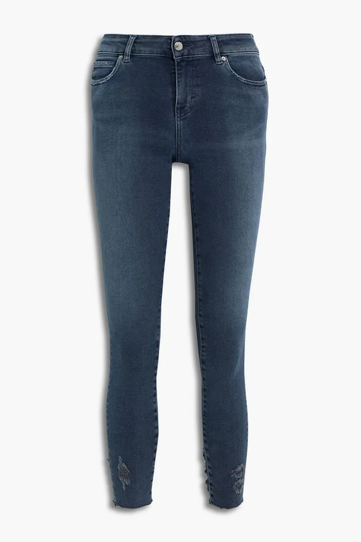 Distressed mid-rise skinny jeans