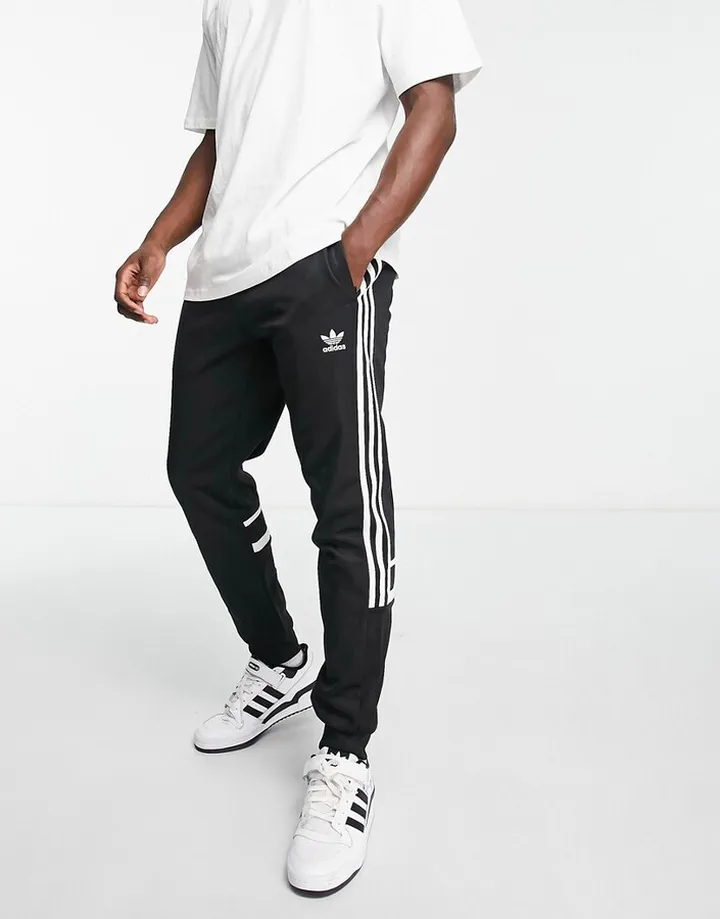 adidas Originals adicolor Challenger three stripe slim fit sweatpants in black
