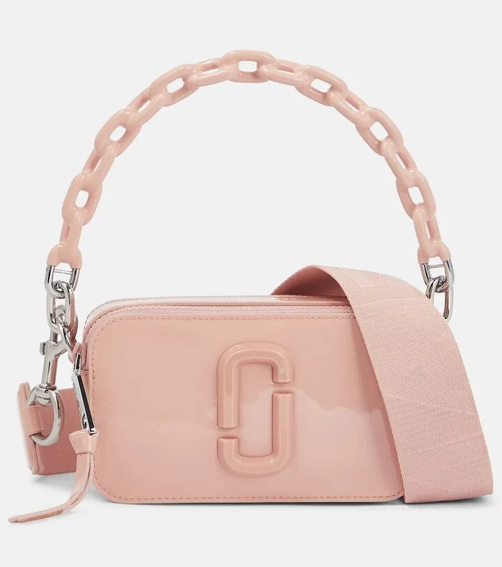 The Snapshot patent leather camera bag