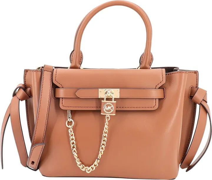 Leather handbag with padlock with monogram