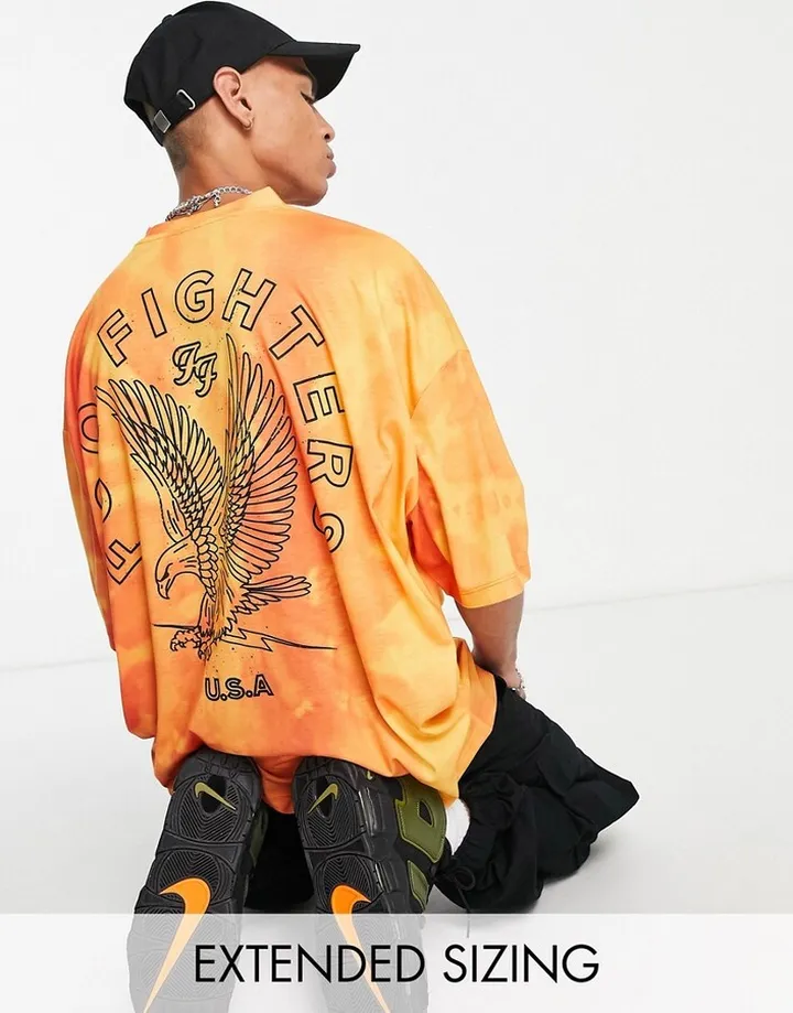 ASOS DESIGN oversized T-shirt with Foo Fighters print in tie dye orange