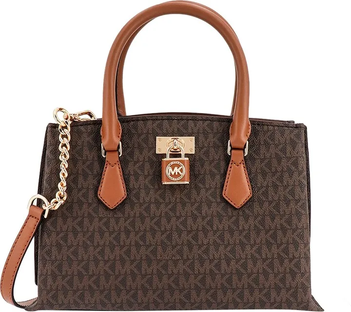 Coated canvas handbag with all-over logo motif