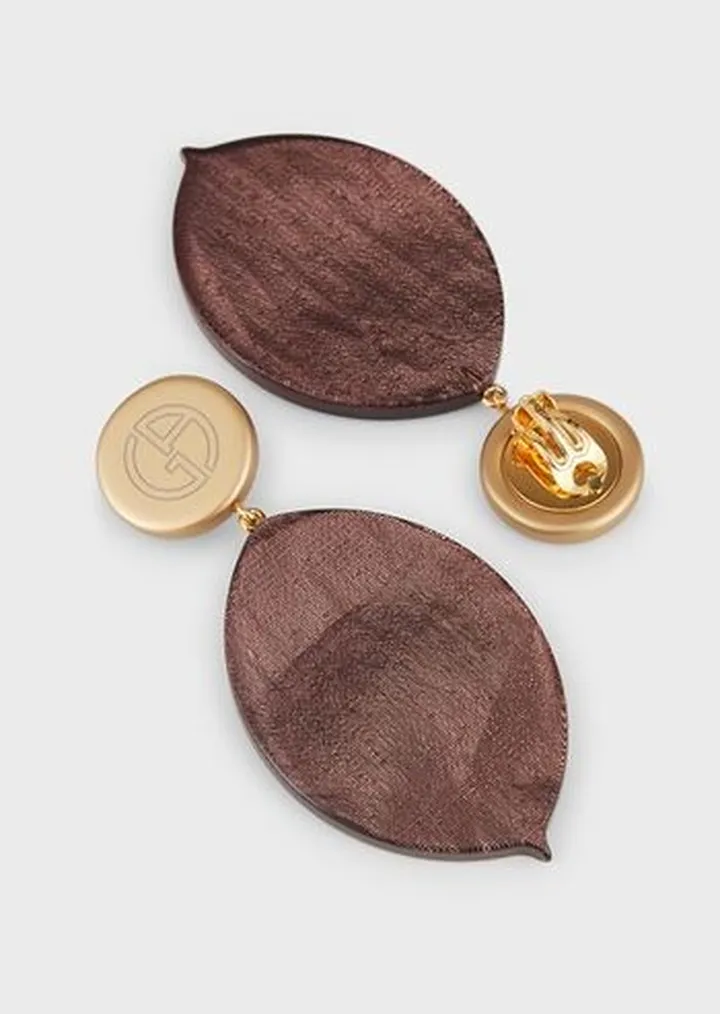 Clip-on earrings with covered pendant