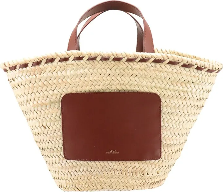 Rafia shoulder bag with leather pocket on the front