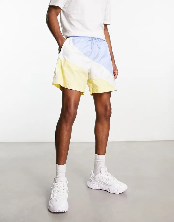 adidas Originals Superstar shorts in blue and yellow