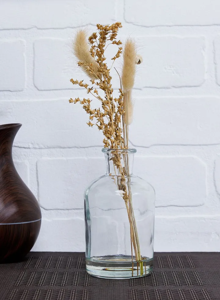 Dried Flowers In Round Glass Vase (Mo)