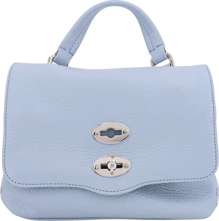 Leather handbag with metal studs
