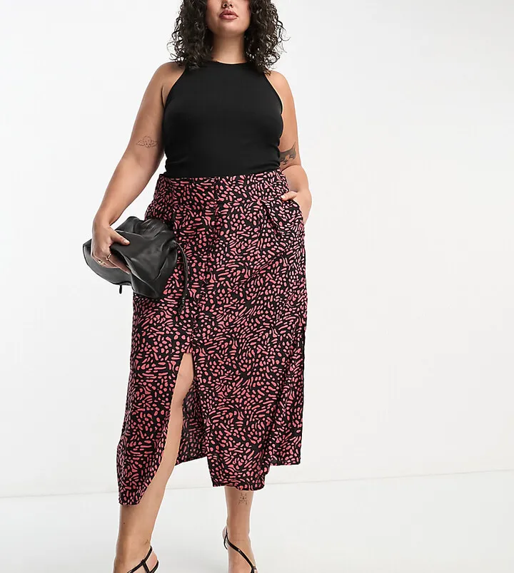 ASOS DESIGN Curve button through midi skirt with split in abstract orange print