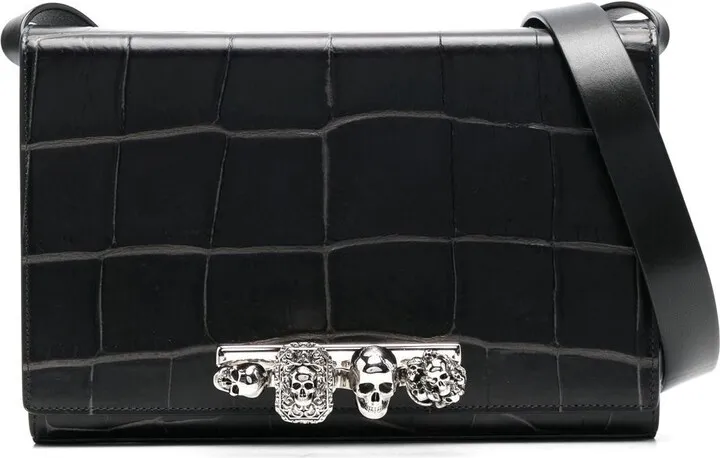 Four Ring leather clutch bag