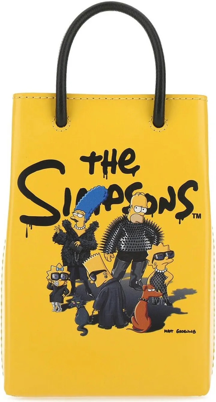 Phone Holder Realized In Smooth Calf Leather Characterized By The Simpsons Print At The Front.