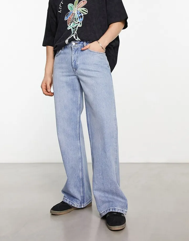 ASOS DESIGN wide flare jeans in mid wash blue