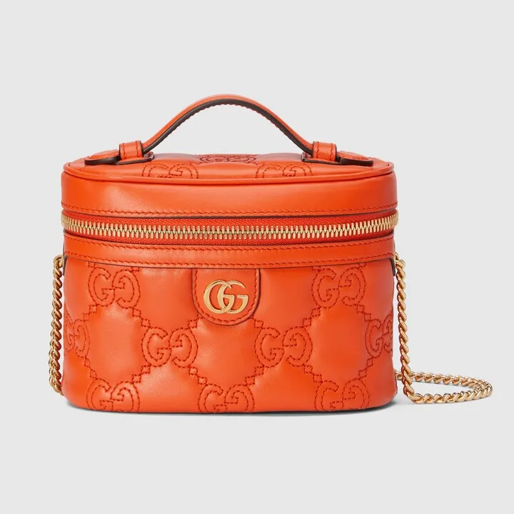 GG Matelassé top handle mini bag