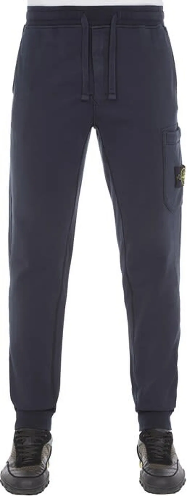Blue sweatpants with side pocket and logo from Stone Island.
