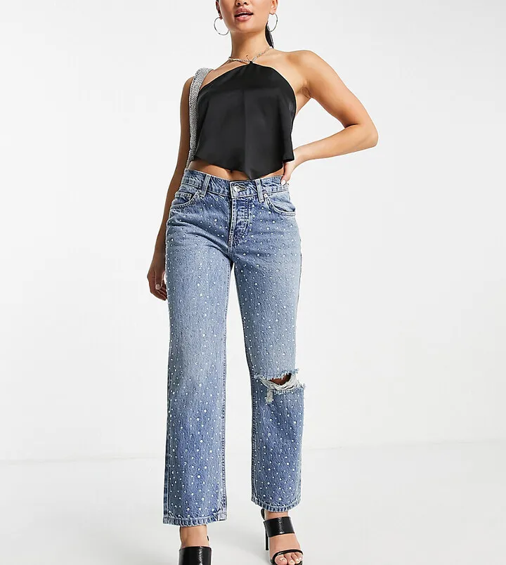 ASOS DESIGN Petite cotton blend low rise straight leg jeans in all over diamante hotfix with ripped knee - MBLUE