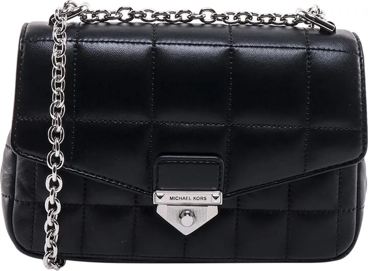 Matelassé leather shoulder bag with engraved logo
